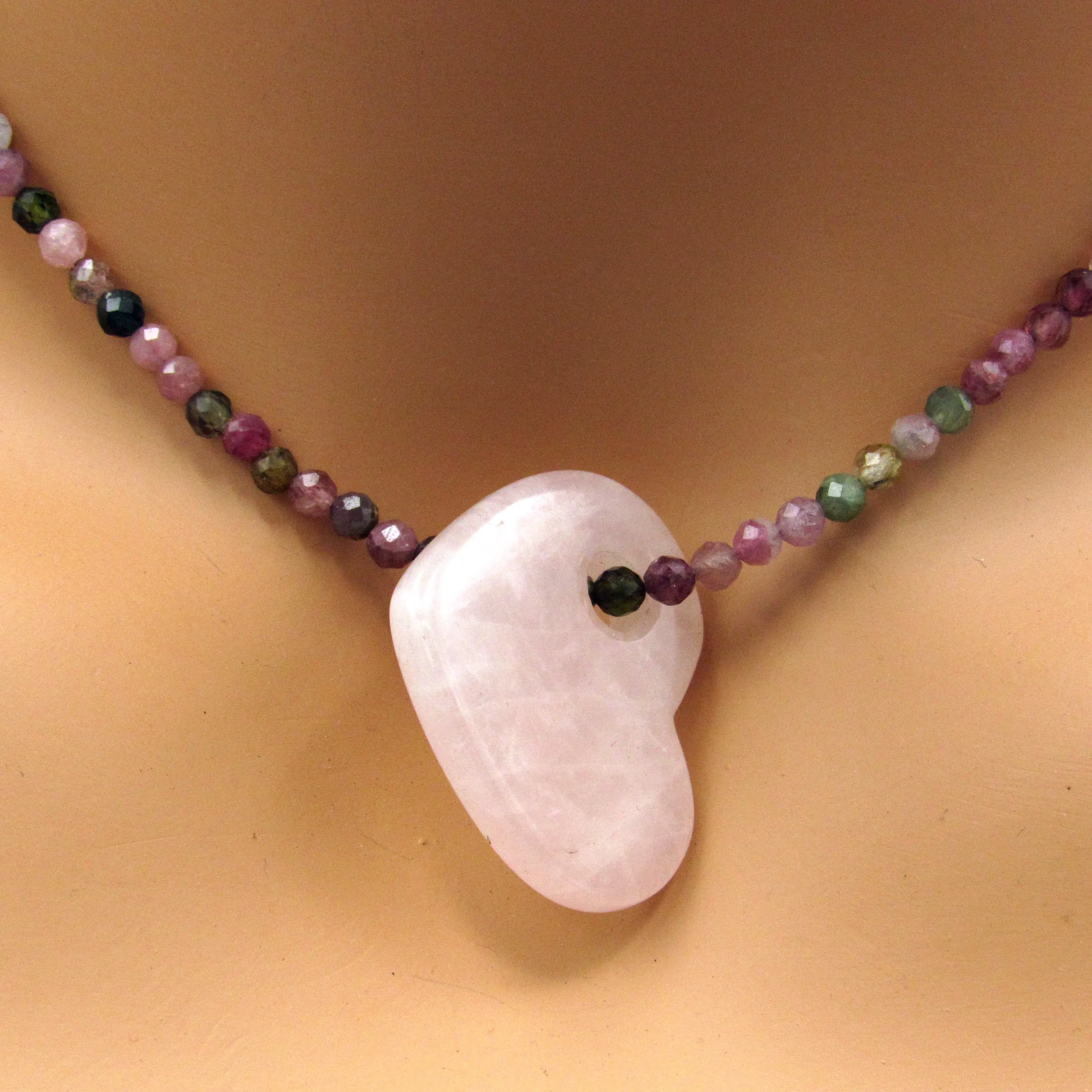 Rose Quartz on mixed tourmaline with 14 kt rose gold filed