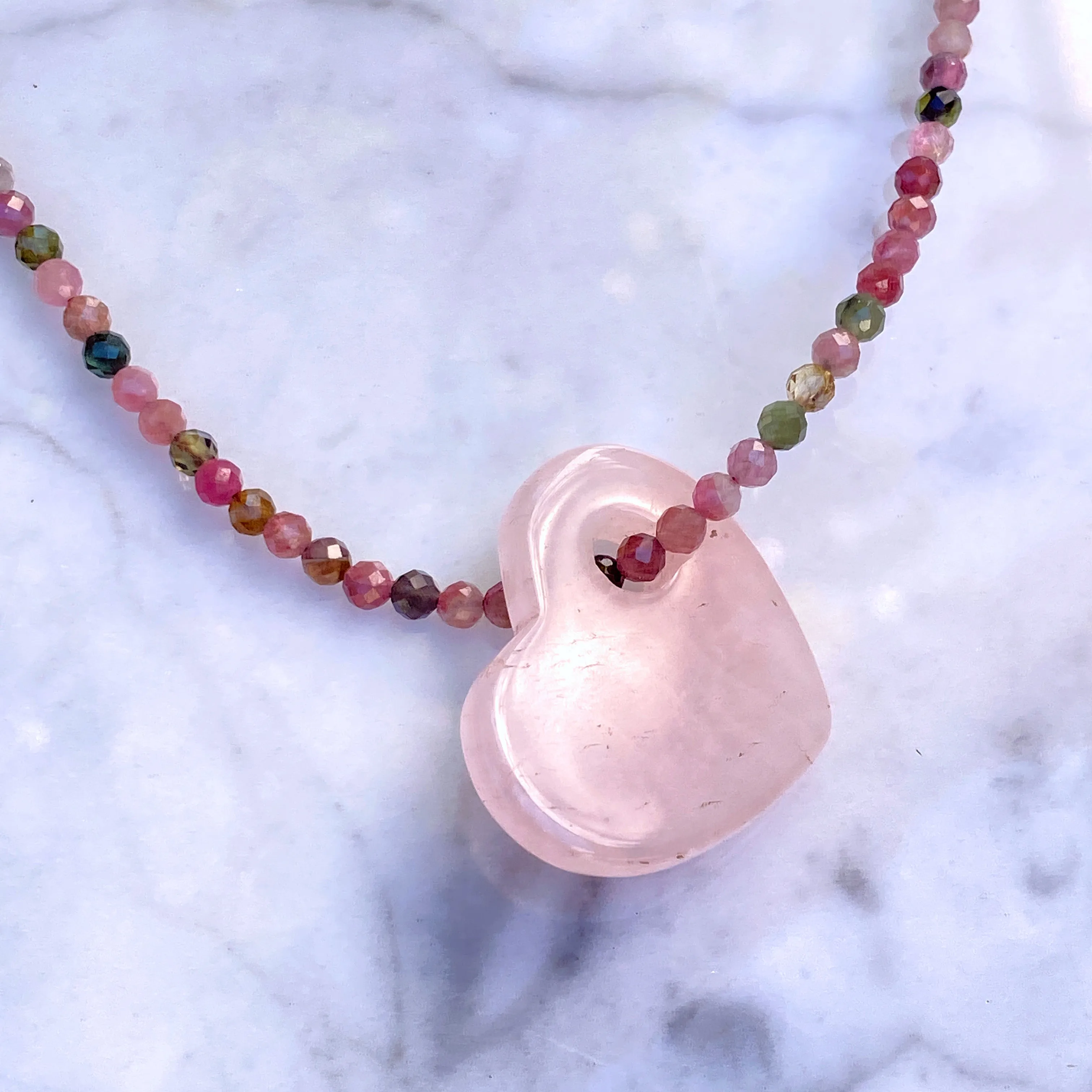 Rose Quartz on mixed tourmaline with 14 kt rose gold filed